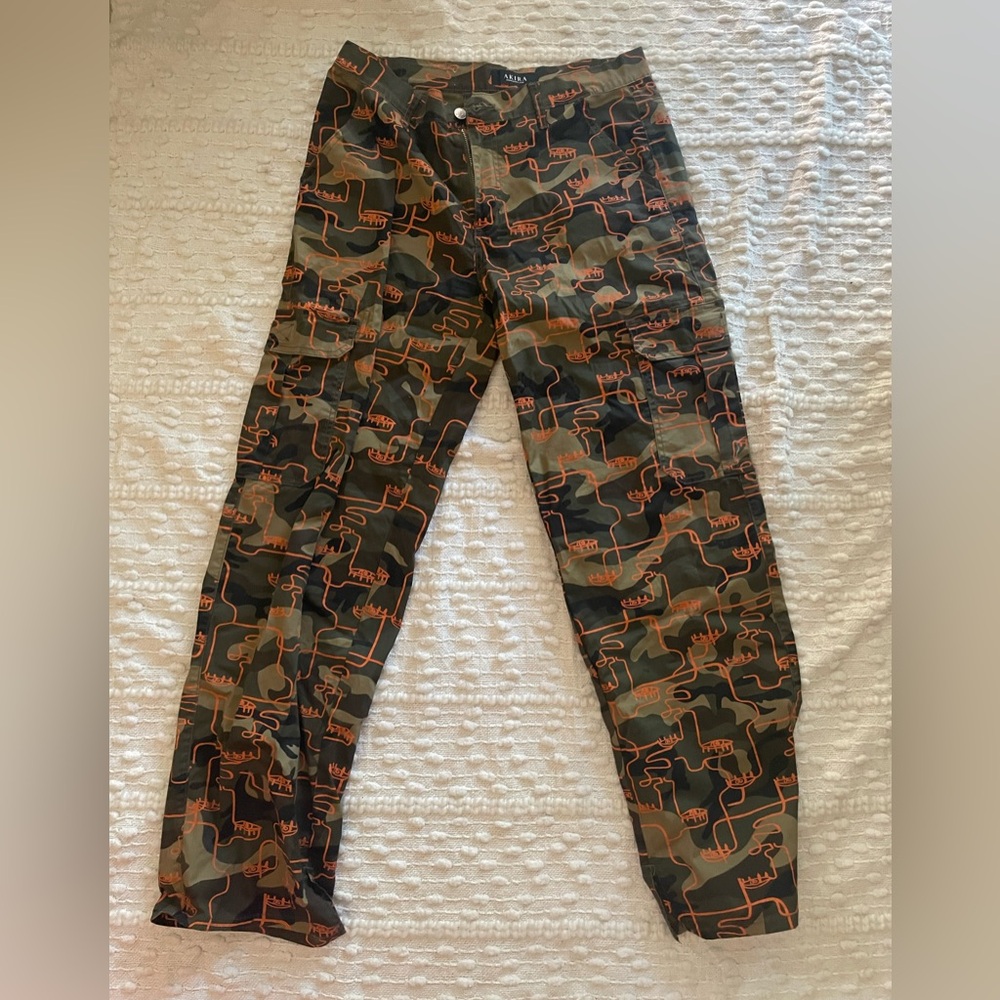 AKIRA Olive Camo Pants with Bright Orange Graphic